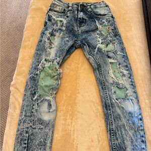Revolution Blue Jeans with Green Patches